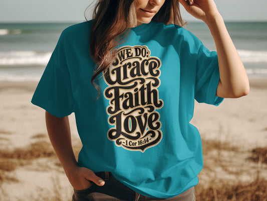 Turquoise t-shirt with text "WE DO: Grace Faith Love - 1 Cor 16:14"