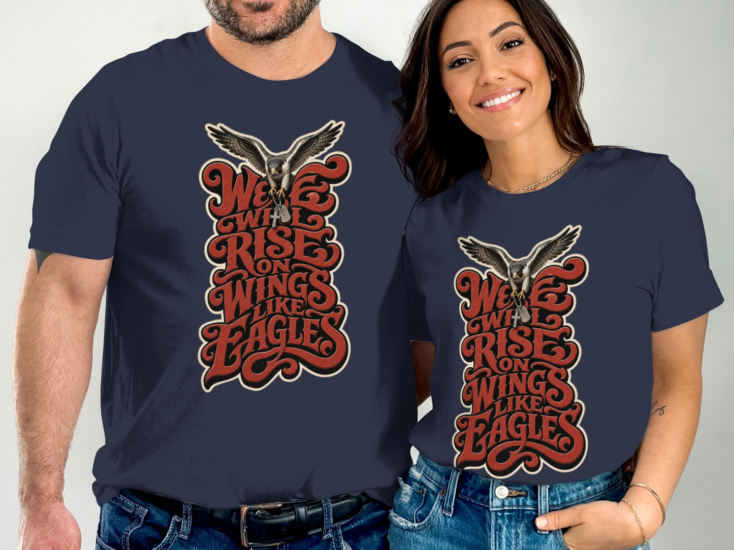 Dark navy t-shirts with "We Will Rise on Wings Like Eagles" text and eagle graphic.