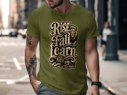 Olive green t-shirt with black and gold text "Rise Fall Learn" and two lions, "Rise Again".