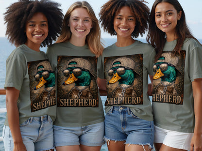 Four women wear olive green t-shirts featuring a graphic of a duck wearing sunglasses and a hat.