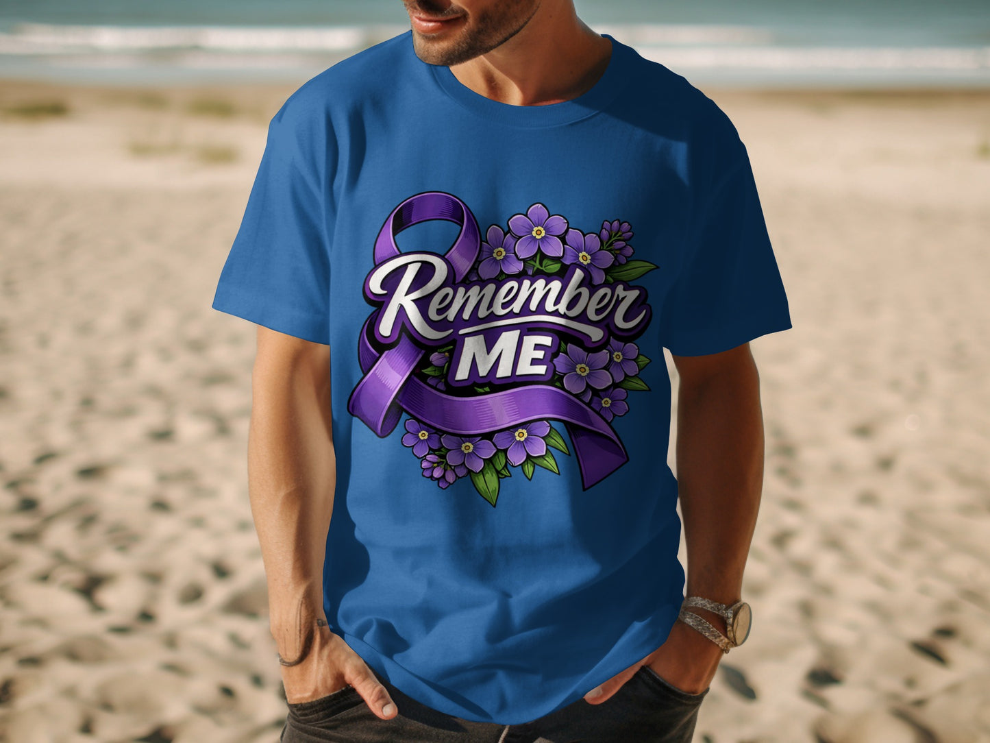 Blue t-shirt with purple ribbon and flowers graphic that reads "Remember ME."