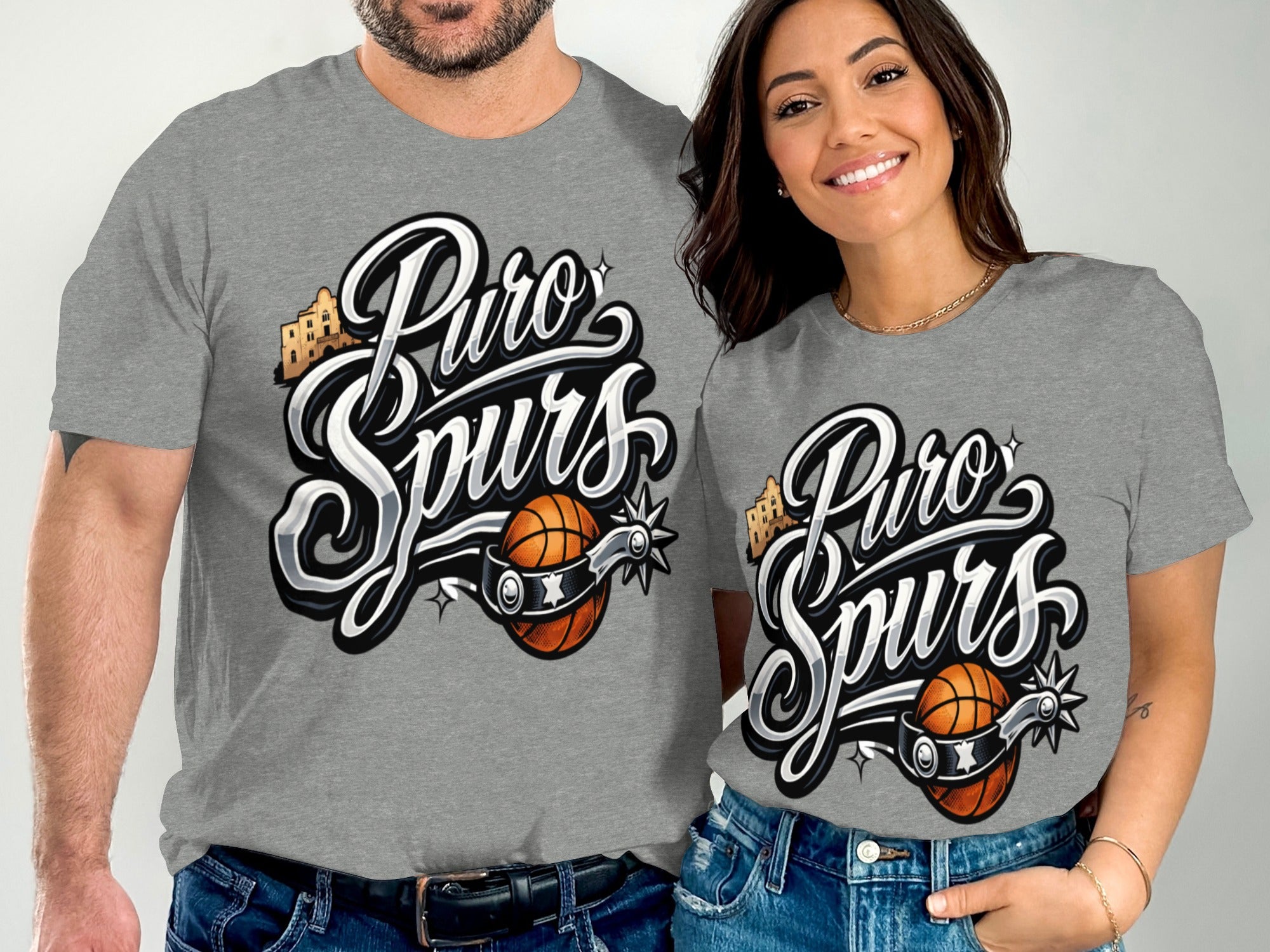 Men and woman wearing grey t-shirts with "Puro Spurs" logo and basketball graphic.