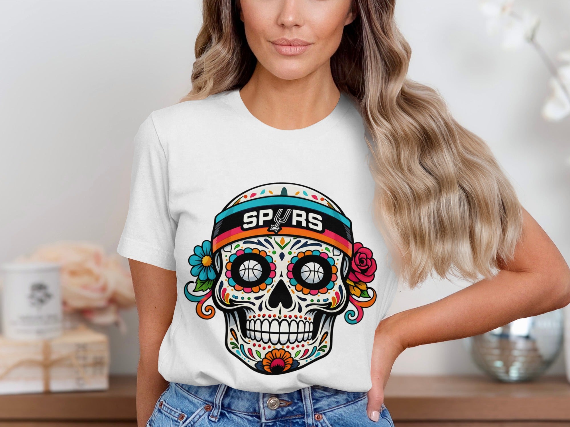 White t-shirt with colorful sugar skull design featuring "Spurs" text.