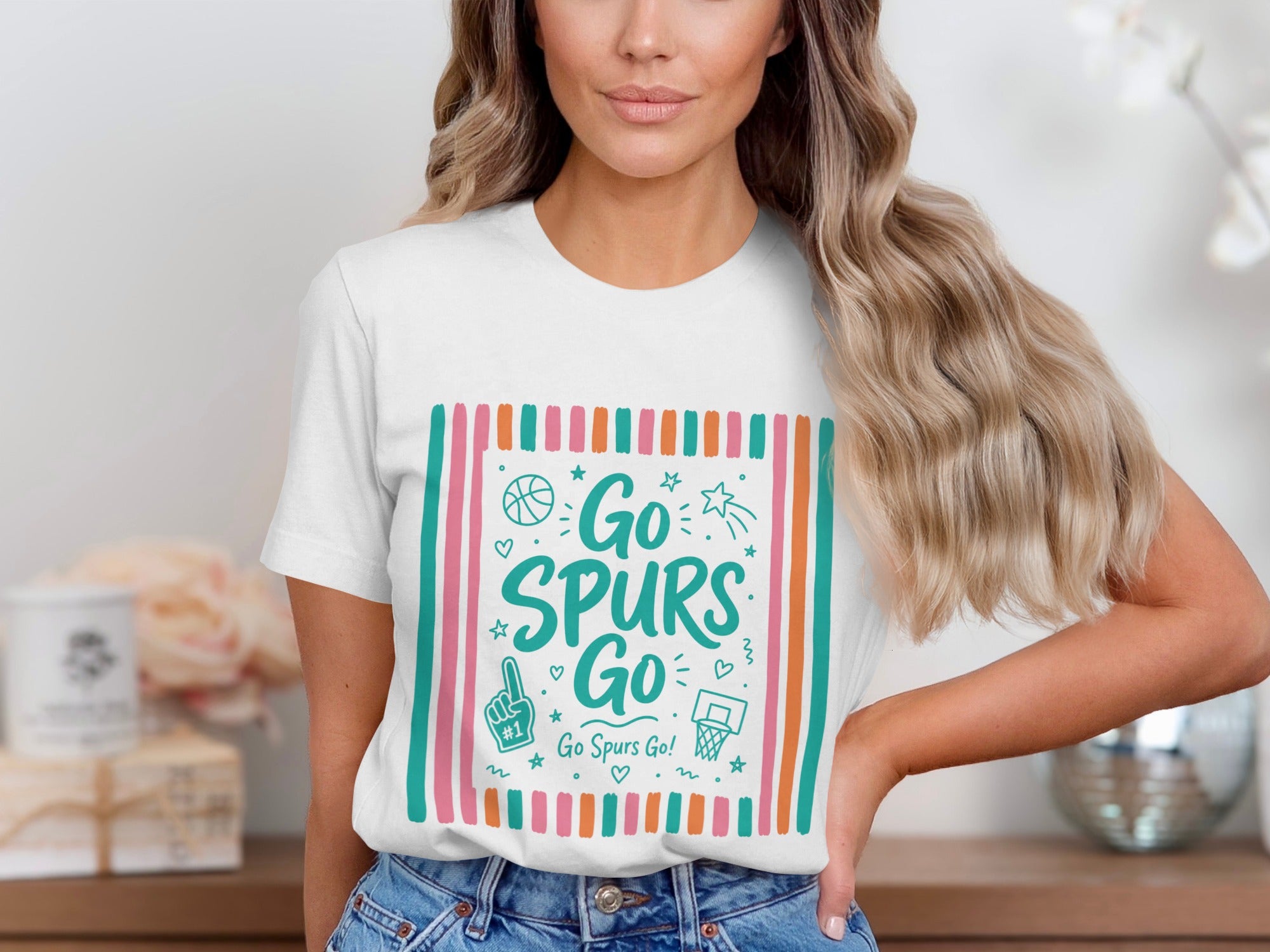 White t-shirt with "Go Spurs Go" text and basketball graphics.