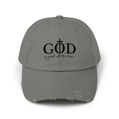 Distressed gray baseball cap with black text "GOD is good all the time."