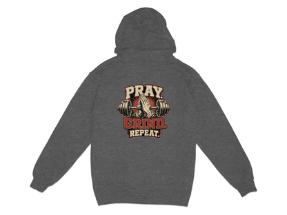 Dark gray hoodie with "PRAY GRIND REPEAT" text and praying hands with barbell.