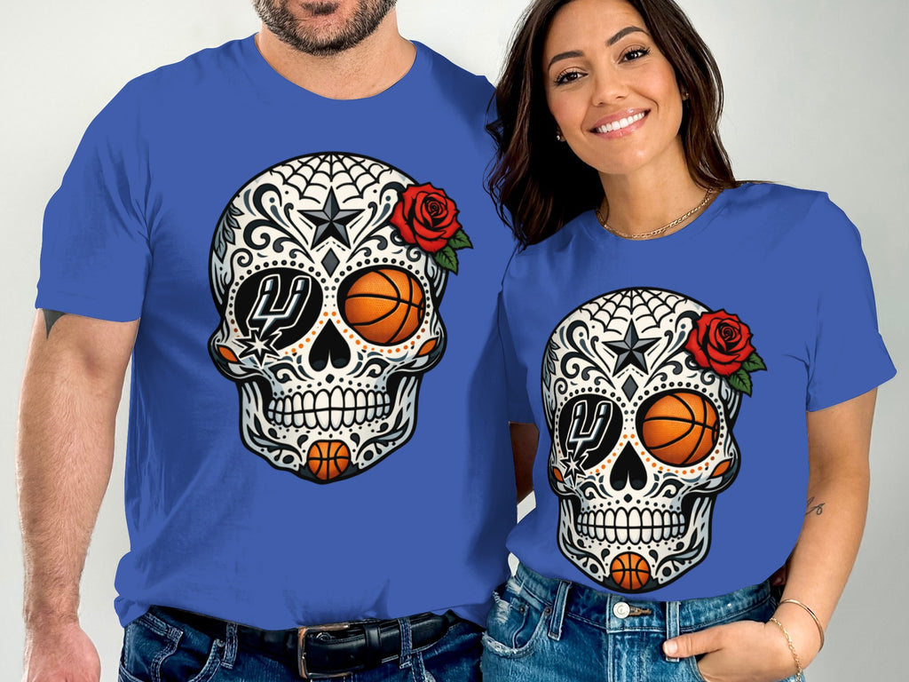 Two people wear blue t-shirts featuring sugar skull designs with basketballs and Spurs logo.