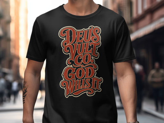Black t-shirt with "DEUS VULT GOD WILLS IT" in stylized red and tan lettering.
