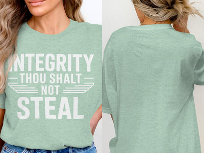 Mint green t-shirt with white text reading "INTEGRITY THOU SHALT NOT STEAL."