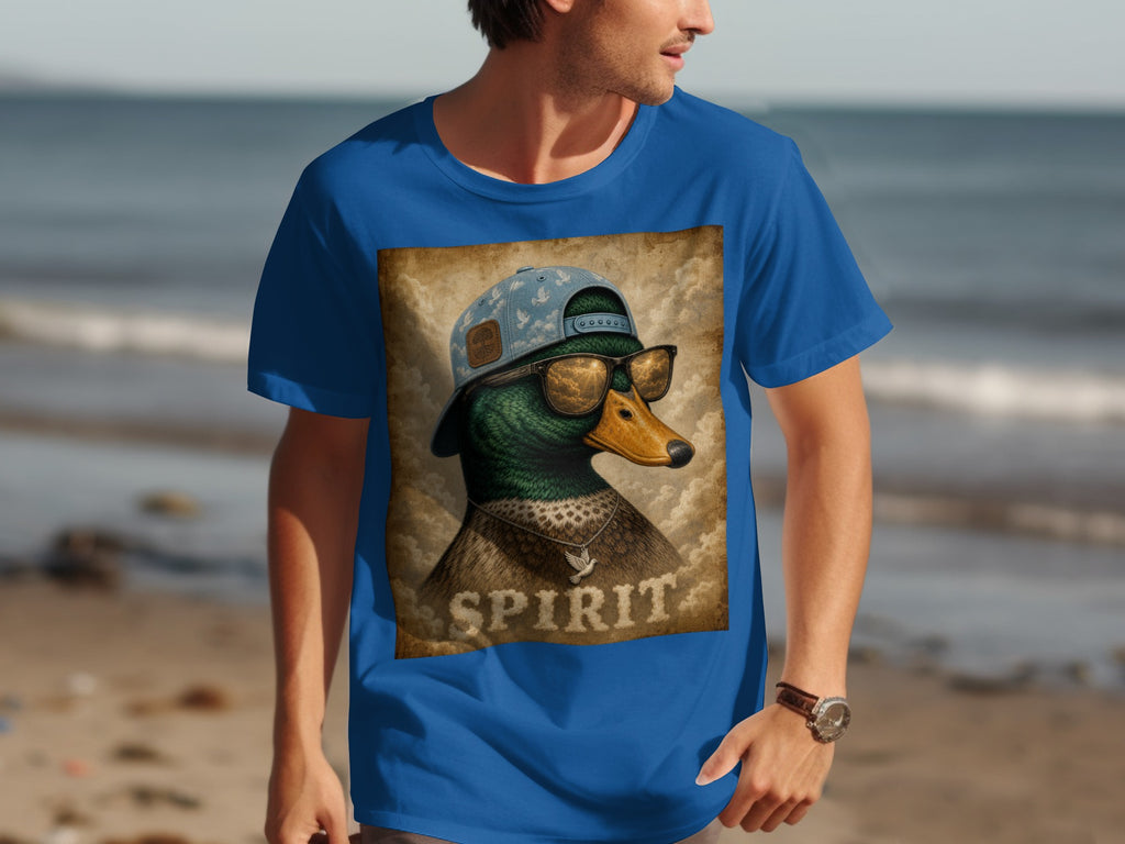 Dressed duck with sunglasses and baseball cap on blue t-shirt, text "SPIRIT" below.