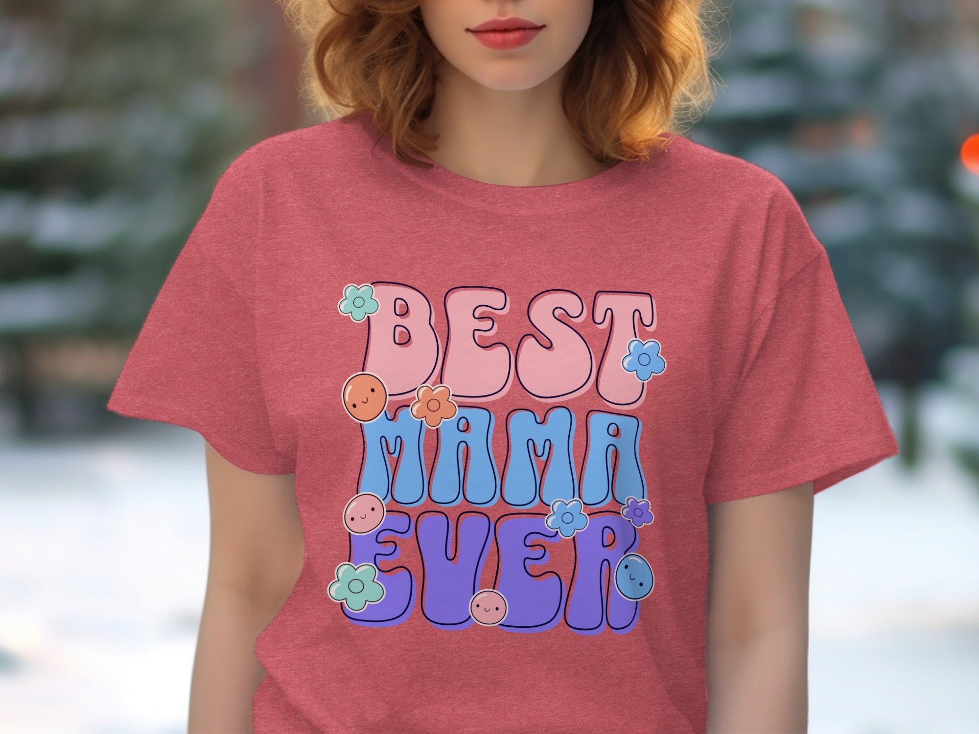 Red t-shirt with retro text "BEST MAMA EVER" and floral accents.