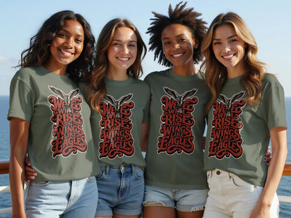 Four women wear olive green t-shirts with eagle graphic and "We Will Rise on Wings Like Eagles" text.
