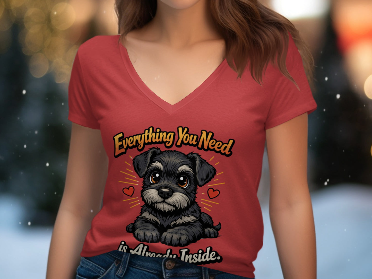 Red v-neck shirt with a cartoon schnauzer and text "Everything You Need is Already Inside."