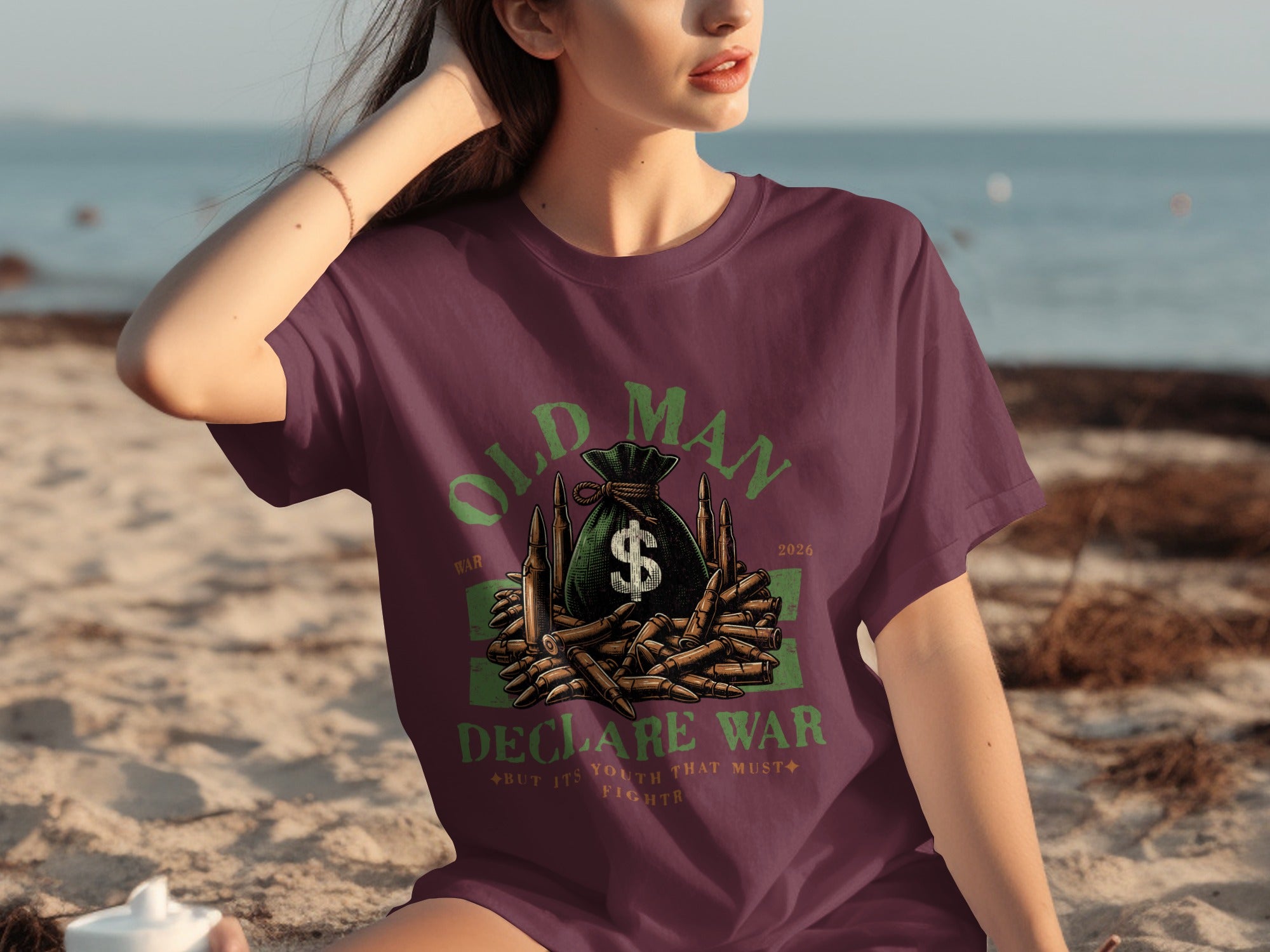 T-shirt graphic with money bag, bullets, and text "OLD MAN WAR 2026 DECLARE WAR".