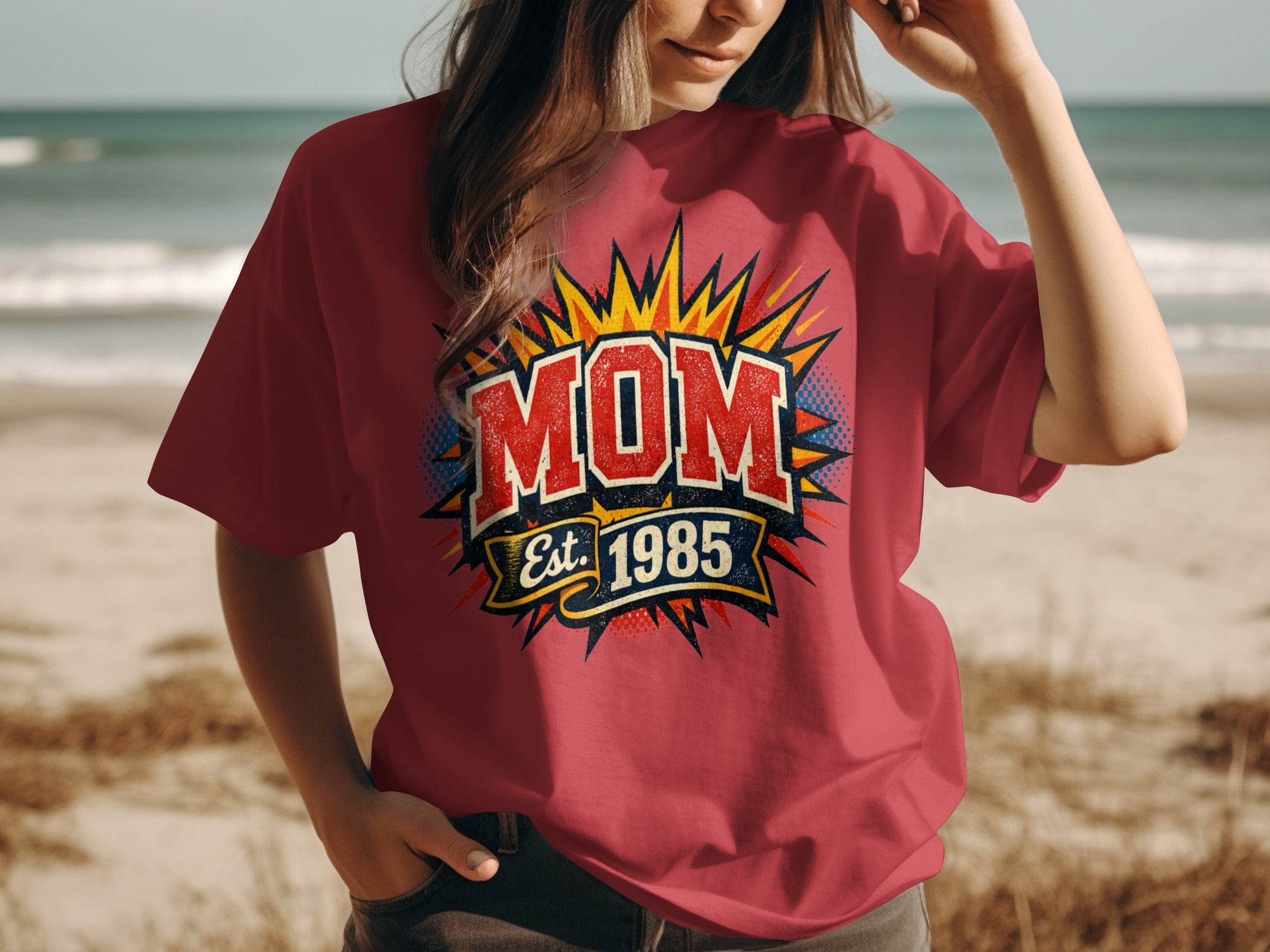 Red t-shirt with "MOM Est. 1985" graphic in a comic book style.