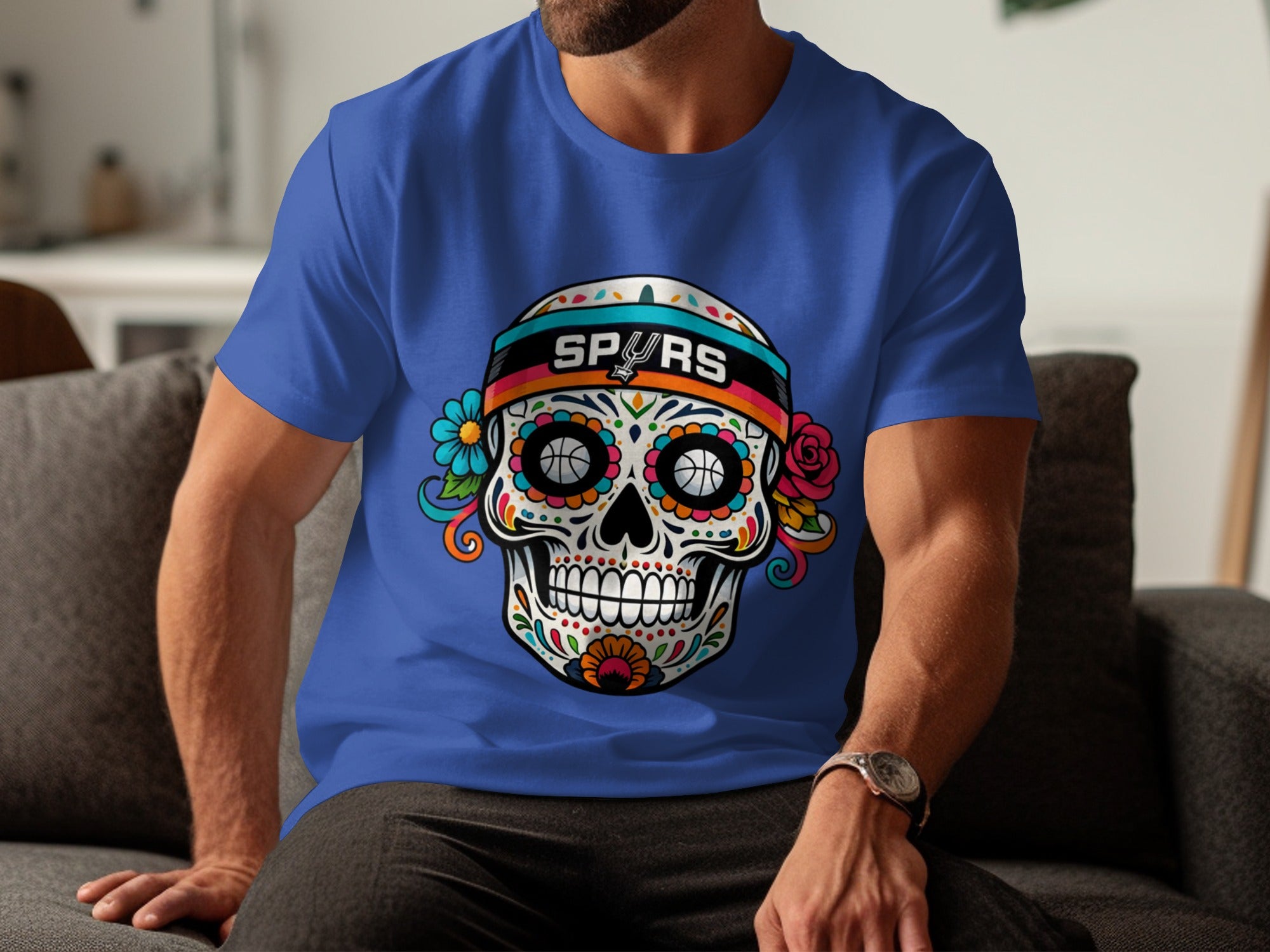 San Antonio Spurs skull graphic on a blue t-shirt with floral accents.