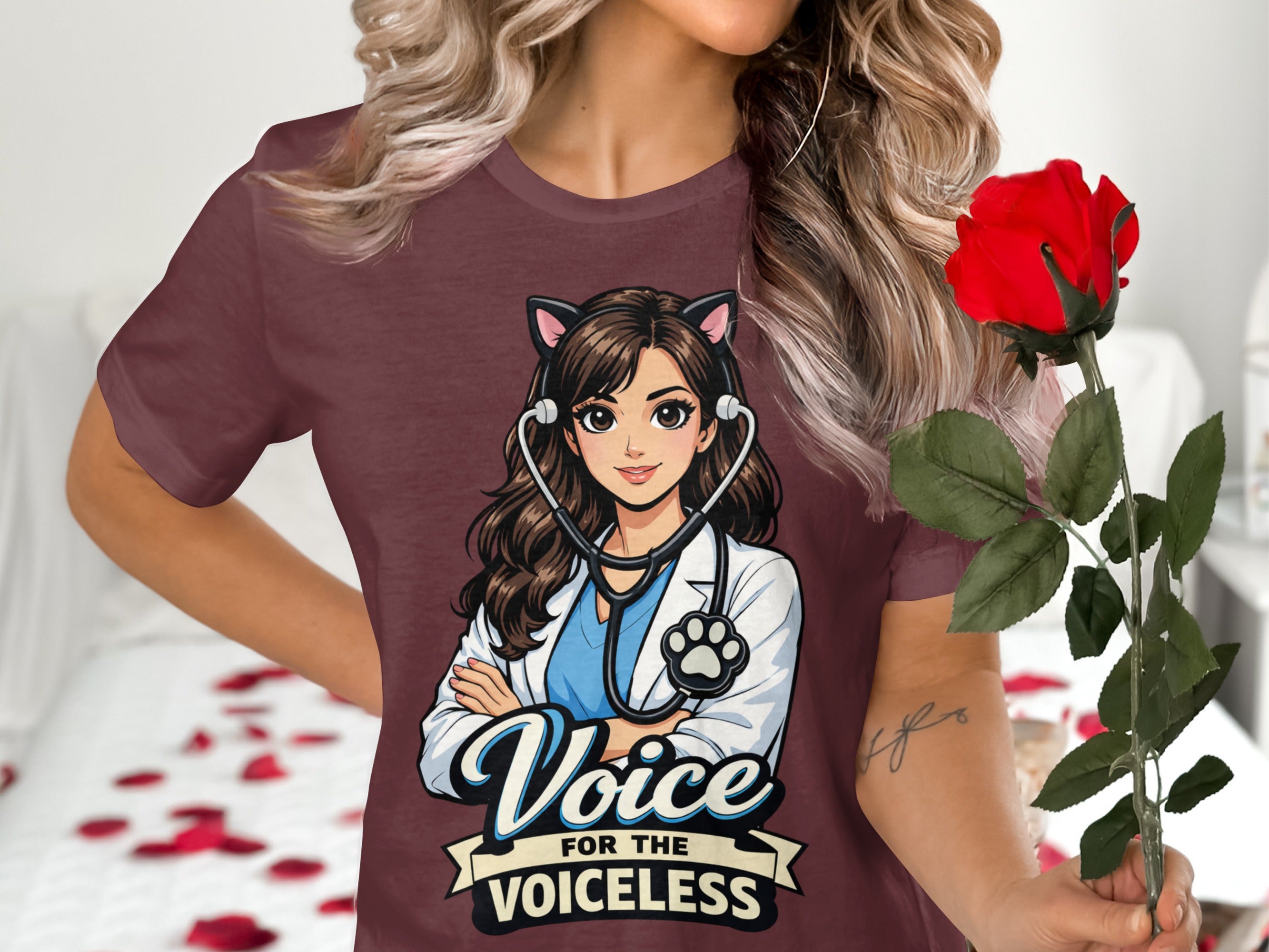 T-shirt graphic of a cartoon veterinarian with cat ears and stethoscope, text reads "Voice for the Voiceless".
