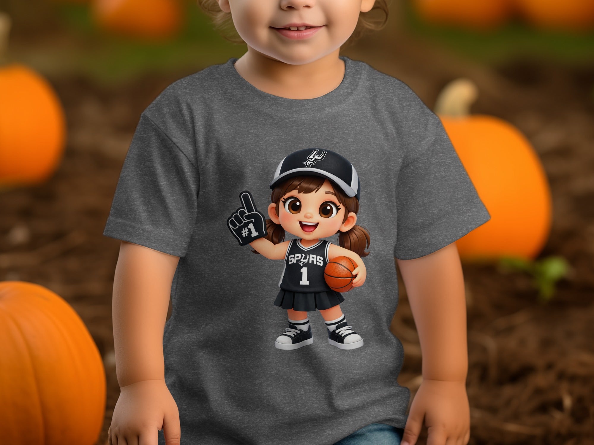 Child's t-shirt with illustration of a cartoon basketball player wearing "SPURS 1".