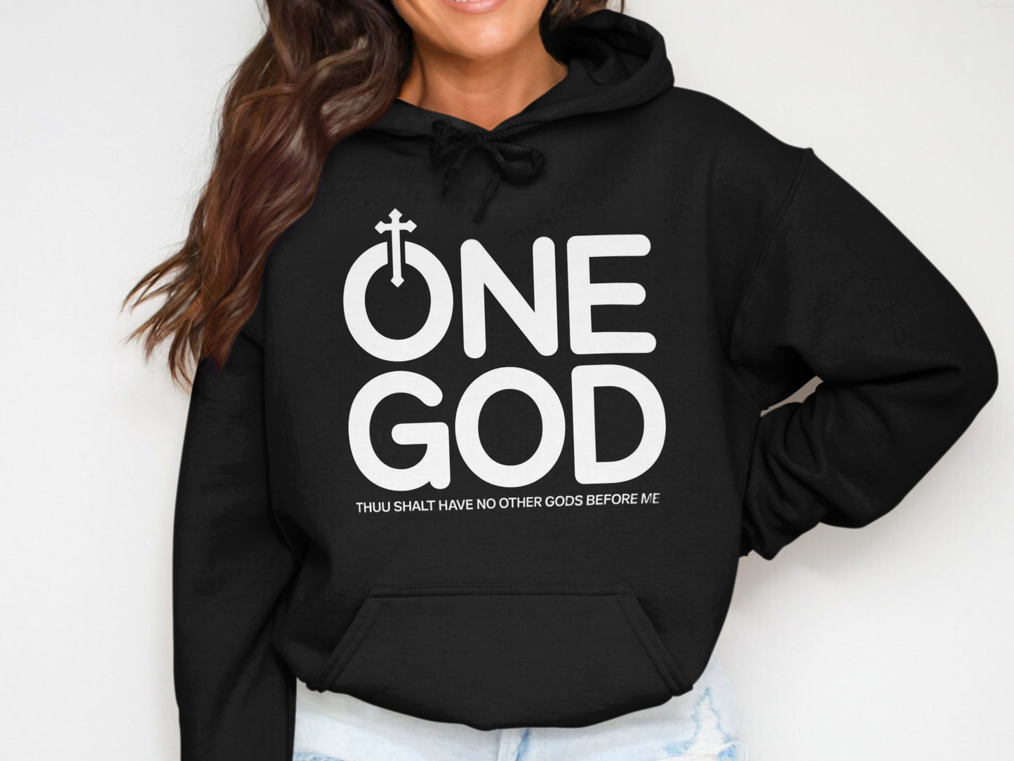 Black hoodie with white text "ONE GOD" and "THOU SHALT HAVE NO OTHER GODS BEFORE ME".