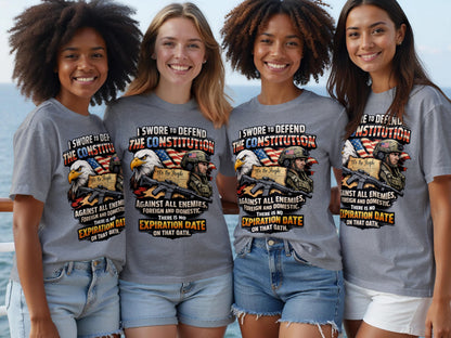 Four women wear grey t-shirts with "I swore to defend the Constitution" and patriotic imagery.