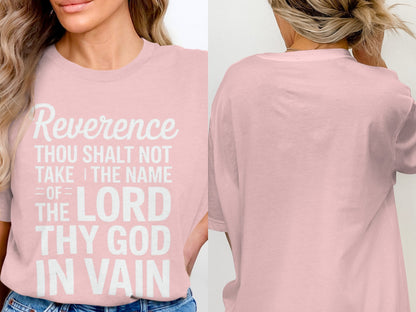 Pink t-shirt with white text: Reverence, Thou shalt not take the name of the Lord thy God in vain.