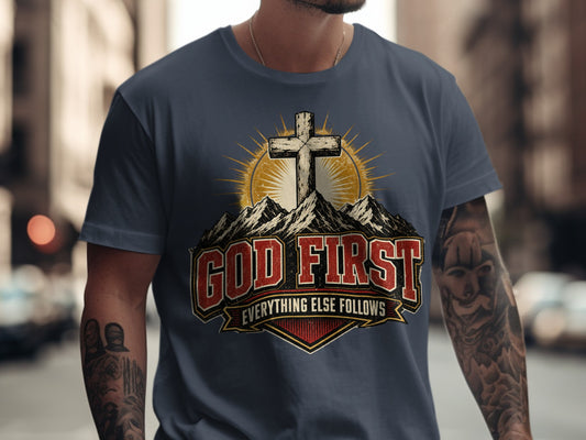 T-shirt with "God First Everything Else Follows" and a cross graphic.