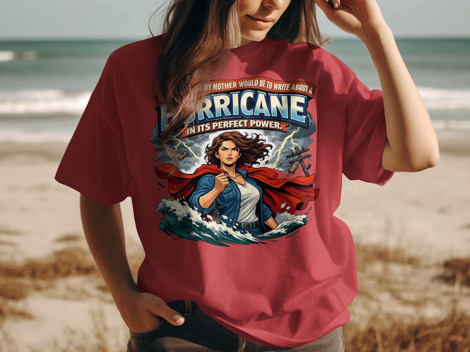 T-shirt with "Hurricane In Its Perfect Power" text and superheroine graphic.