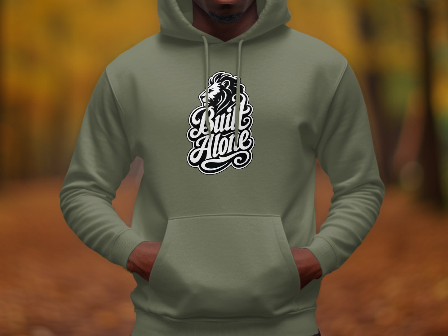 Olive green hoodie with a black and white lion and "Built Alone" text graphic.