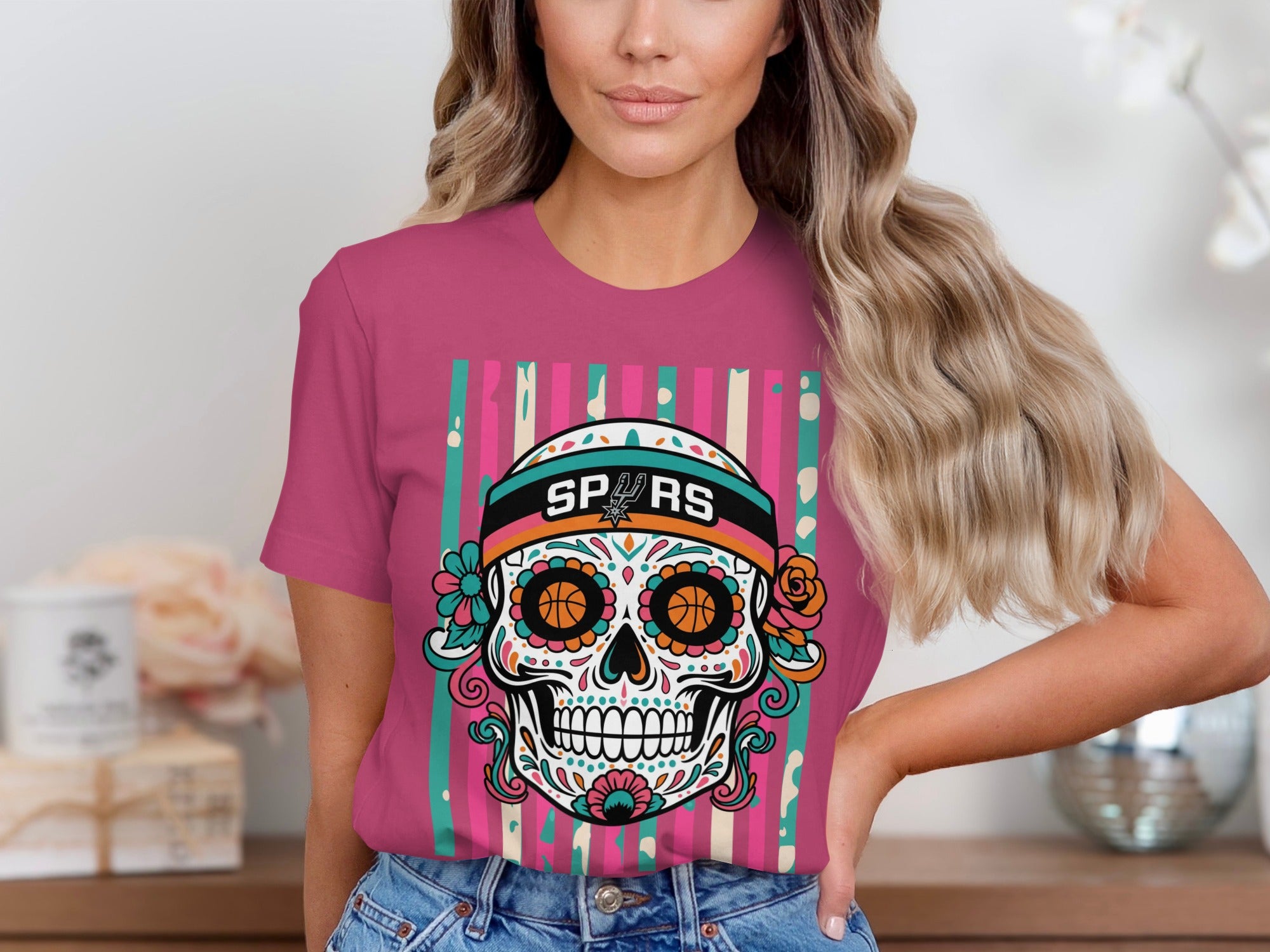 T-shirt with a colorful skull graphic featuring basketballs and "SPURS" text.