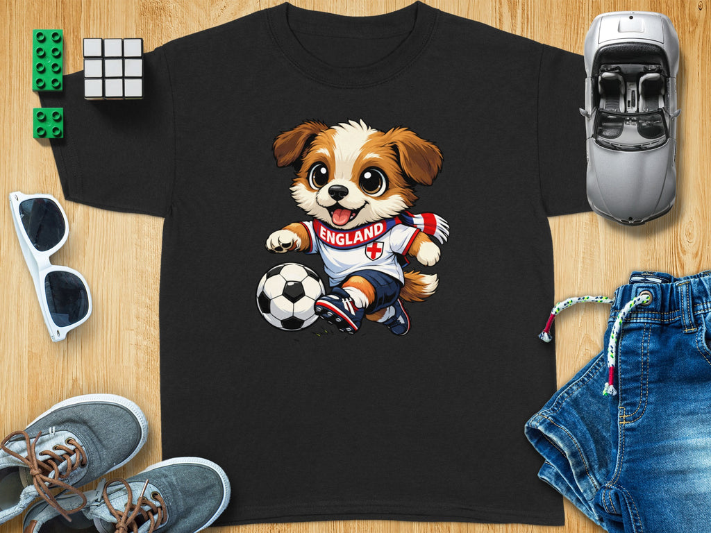Black t-shirt with a cartoon dog playing soccer and wearing an England scarf.