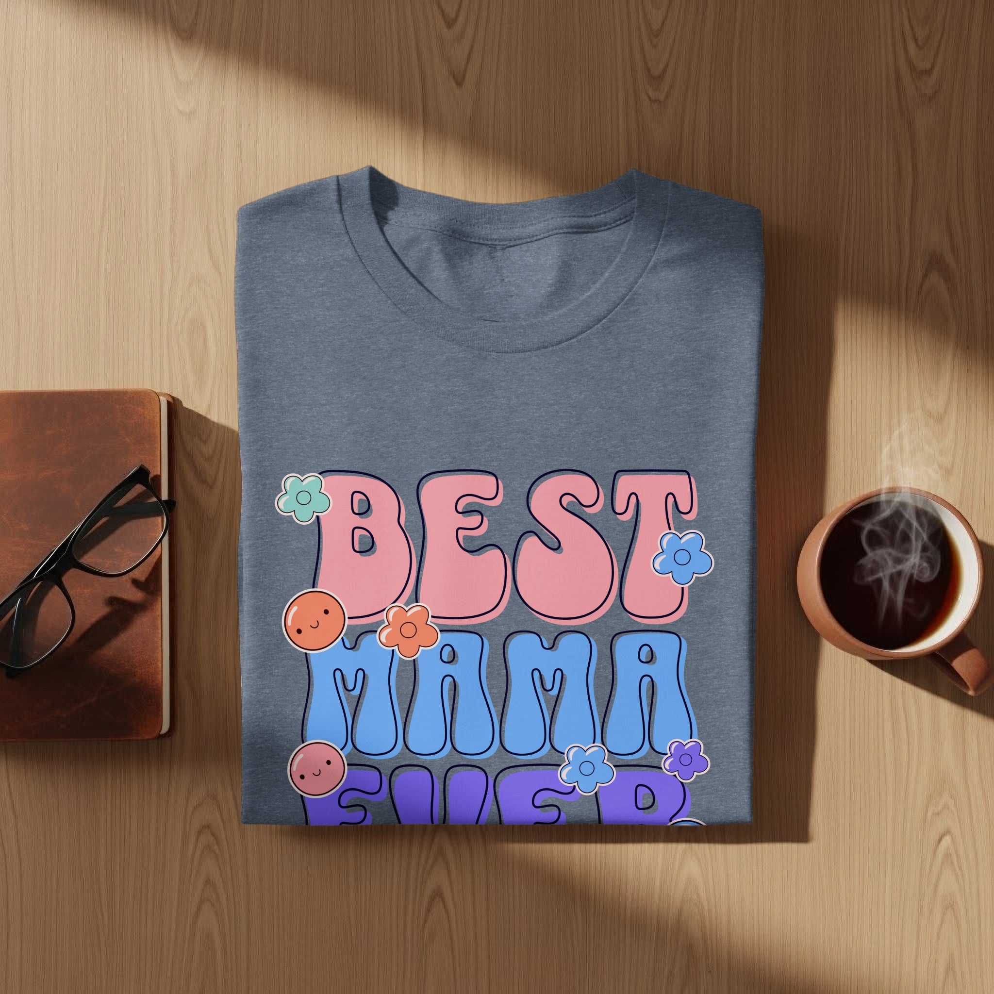 Gray t-shirt with text "BEST MAMA EVER" in retro bubble letters.