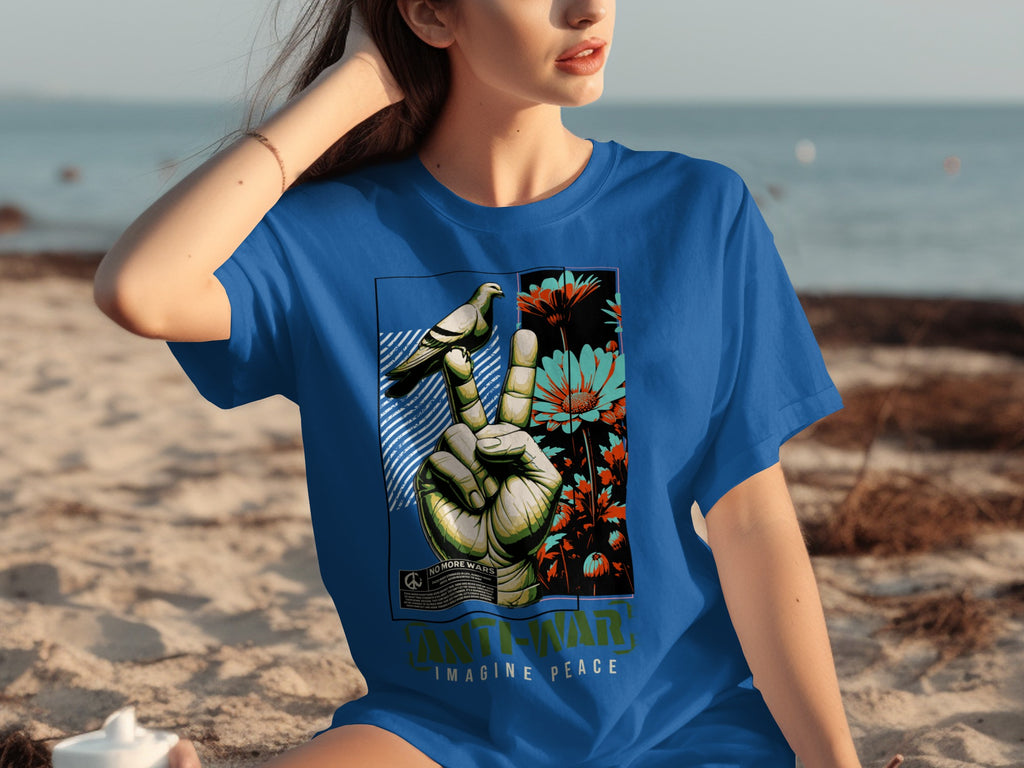 Blue t-shirt with graphic of hand, dove, flowers, and text "No More Wars. Anti-War. Imagine Peace."