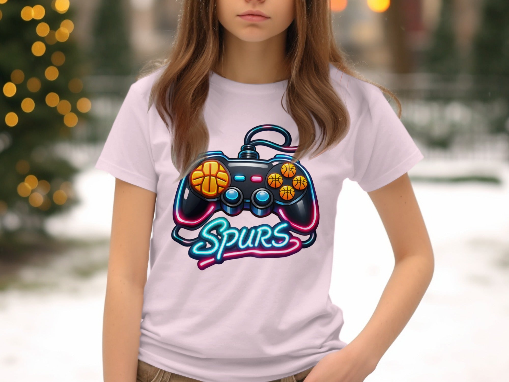 White t-shirt with a neon video game controller and basketballs, featuring the word "Spurs".