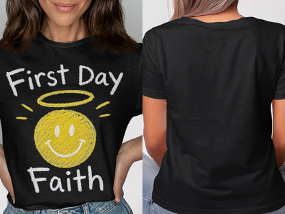Black t-shirt with "First Day Faith" and a smiling halo graphic.