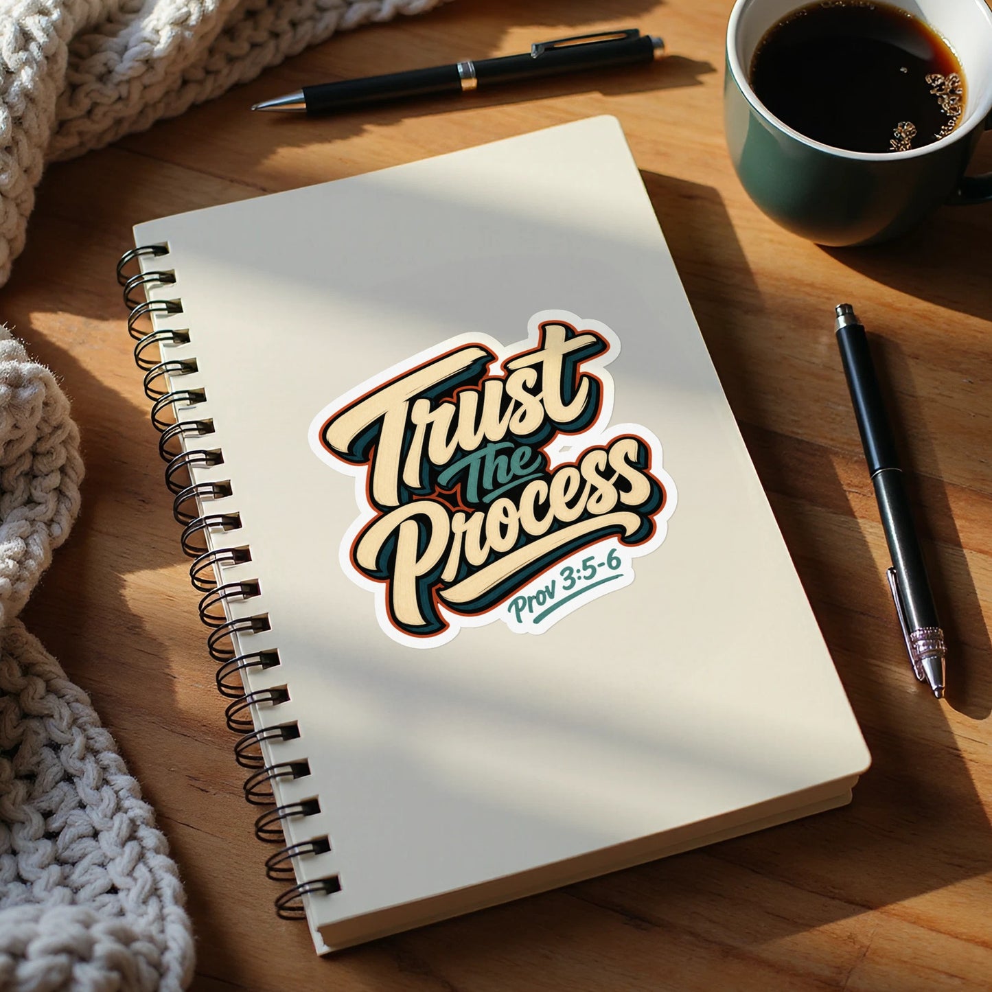Sticker on a notebook reads "Trust The Process" with "Prov 3:5-6".