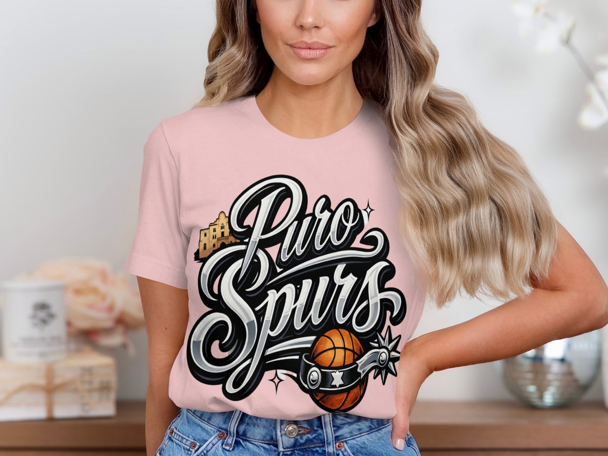 Pink t-shirt with "Puro Spurs" text, basketball, and spur graphic.