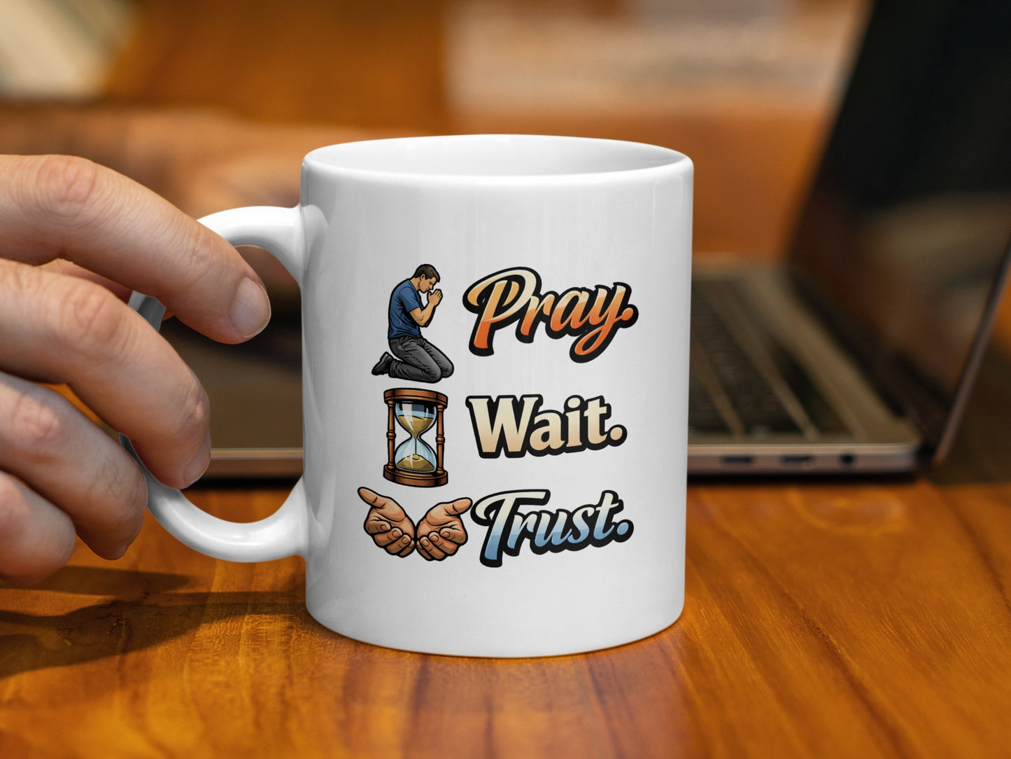 Mug with "Pray. Wait. Trust." text and religious imagery.