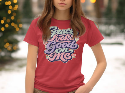 Red t-shirt with "Grace Looks Good on Me" in colorful retro lettering.