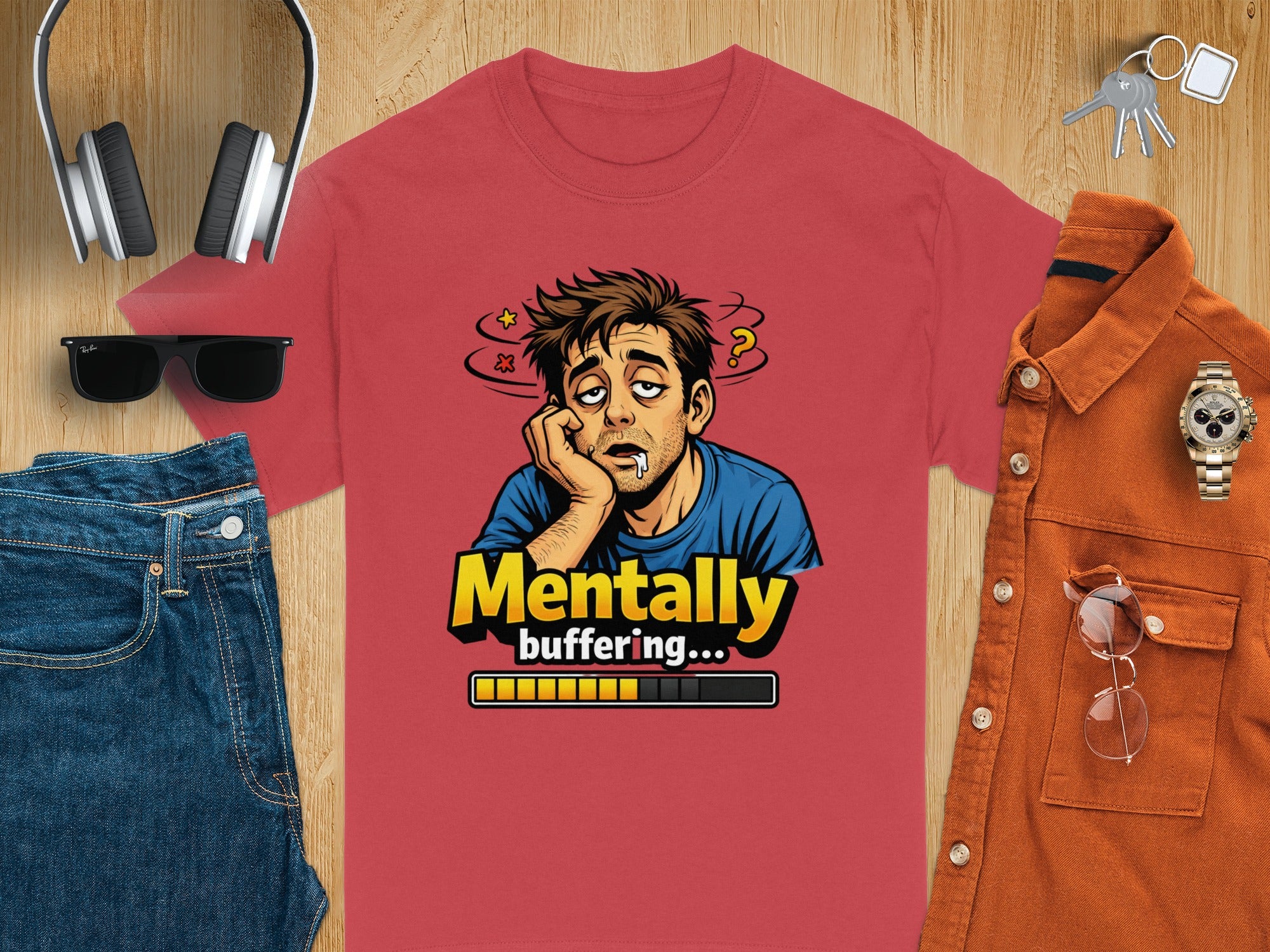 T-shirt with cartoon of tired man and text "Mentally buffering..."
