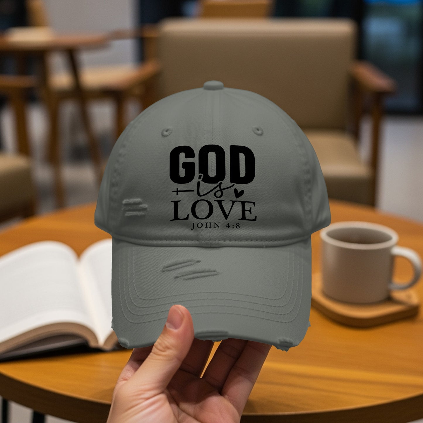 Gray distressed baseball cap with "GOD is LOVE JOHN 4:8" text.