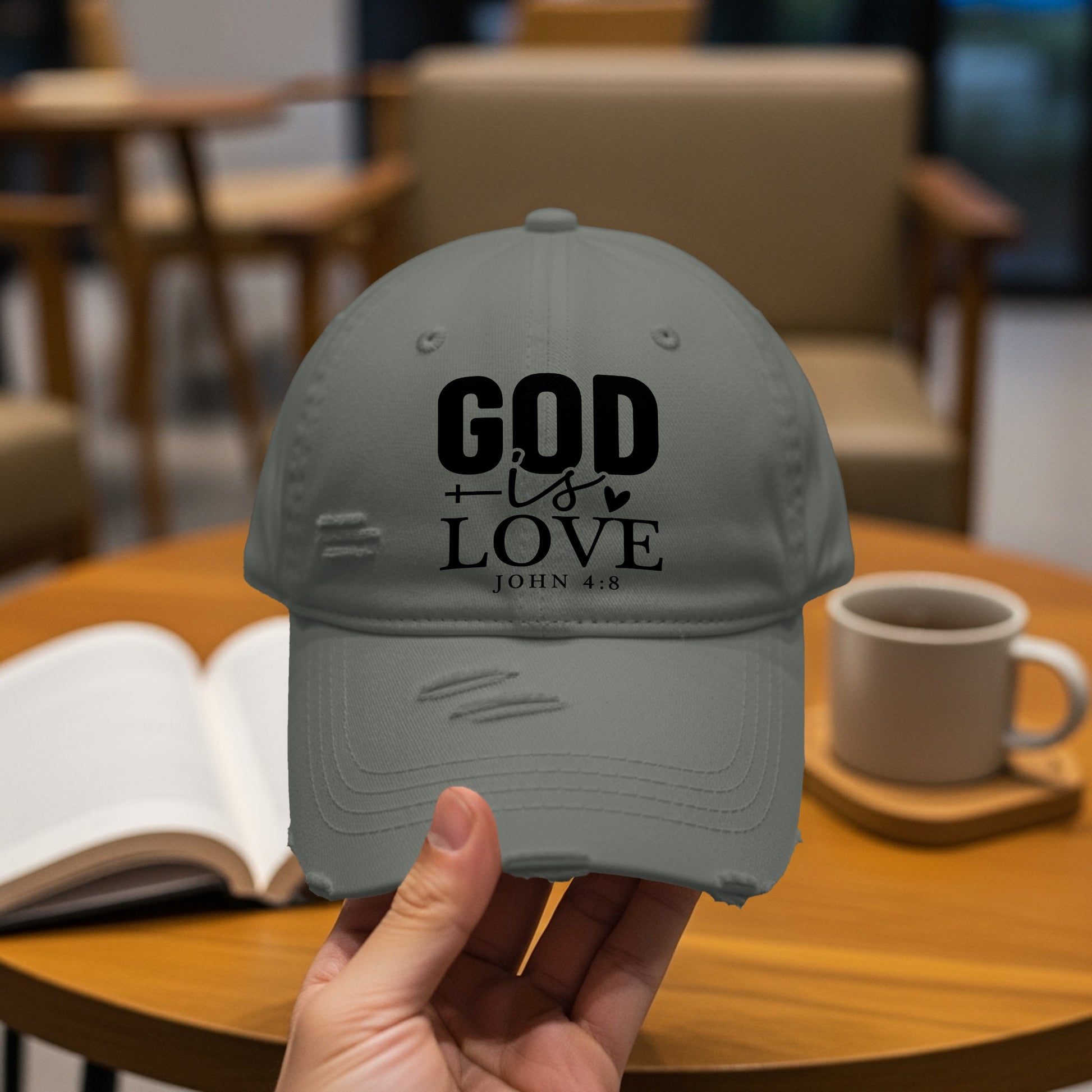 Gray distressed baseball cap with "GOD is LOVE JOHN 4:8" text.