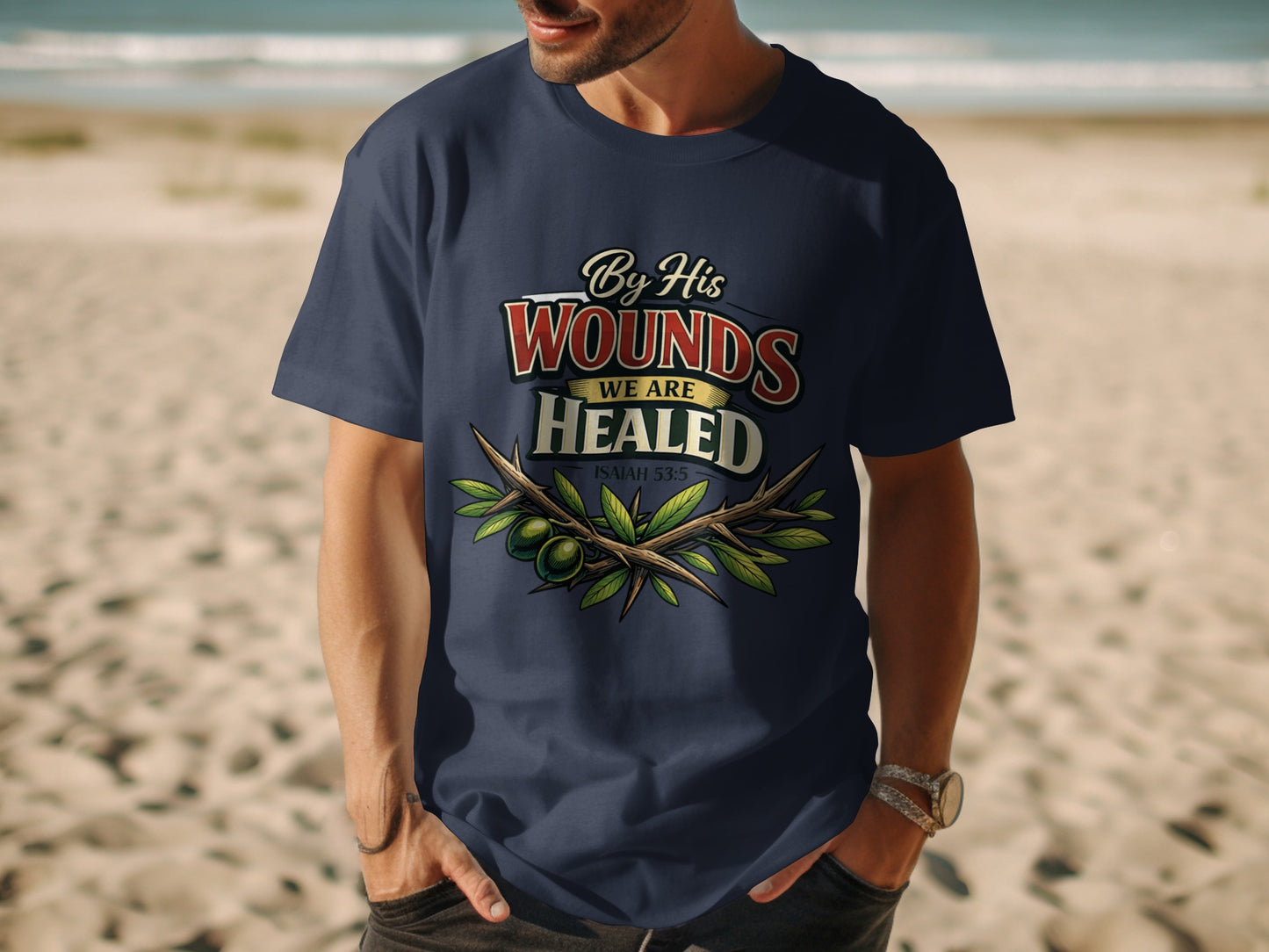 Dark blue t-shirt with "By His Wounds We Are Healed Isaiah 53:5" text and olive branches.