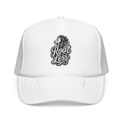 White trucker hat with embroidered lion and "Roar Less" text.