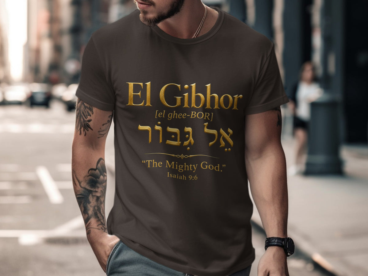 Brown t-shirt with gold text: "El Gibhor," Hebrew script, "The Mighty God," Isaiah 9:6.