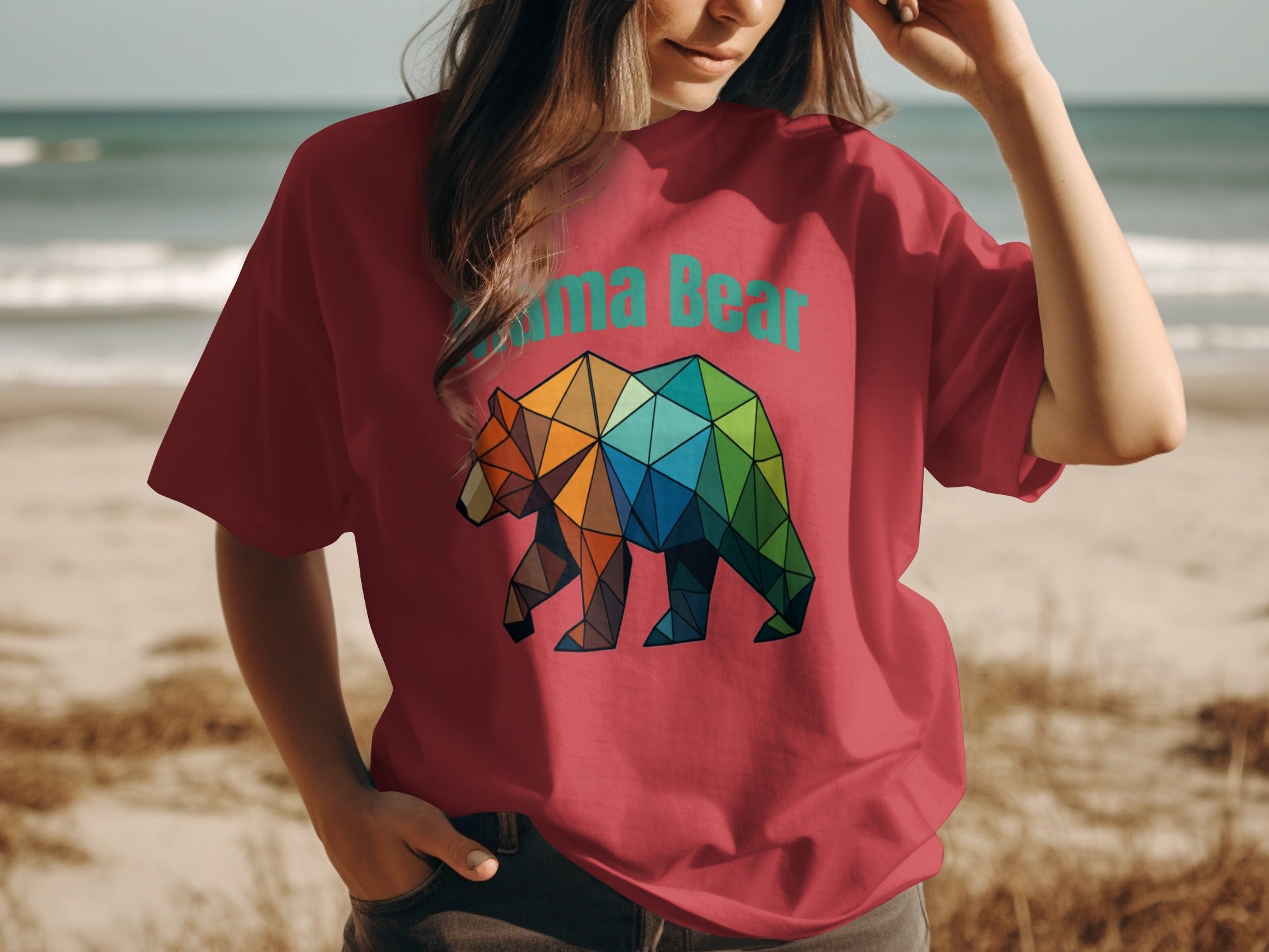 Red t-shirt with geometric bear graphic and "Mama Bear" text.