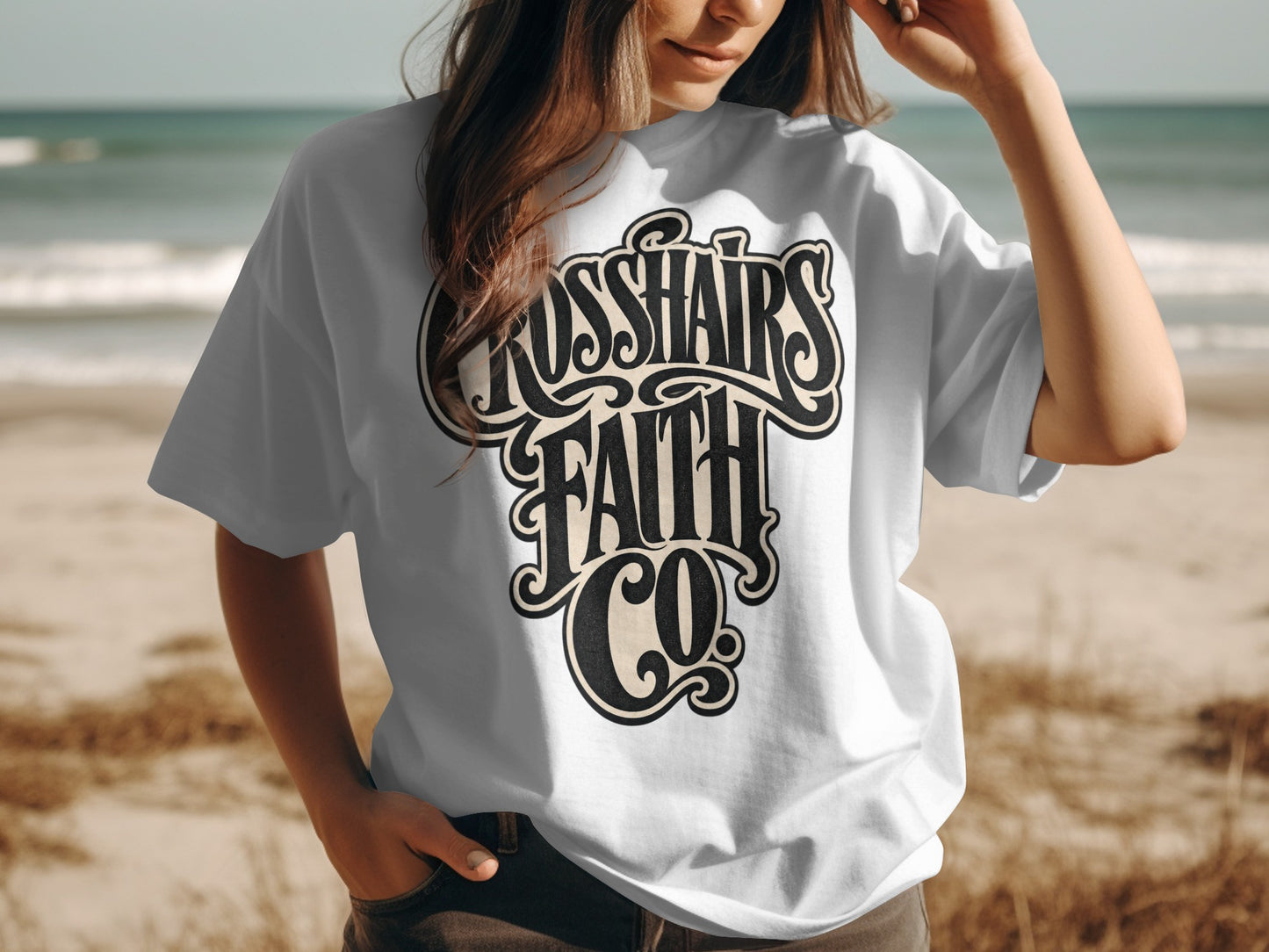 White t-shirt with "CROSSHAIRS FAITH CO" text in a decorative font.