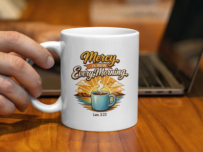 White mug with text "Mercy is new Every Morning" and scripture "Lam. 3:23".