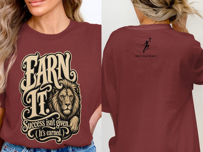 Maroon t-shirt with stylized lion graphic and text "EARN IT. Success isn't given. (It's earned.)"