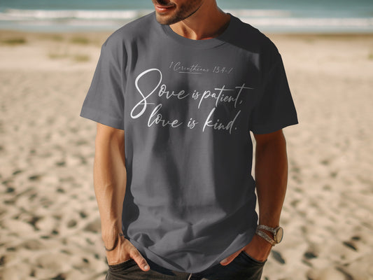 Dark grey t-shirt with white text "Love is patient, love is kind."