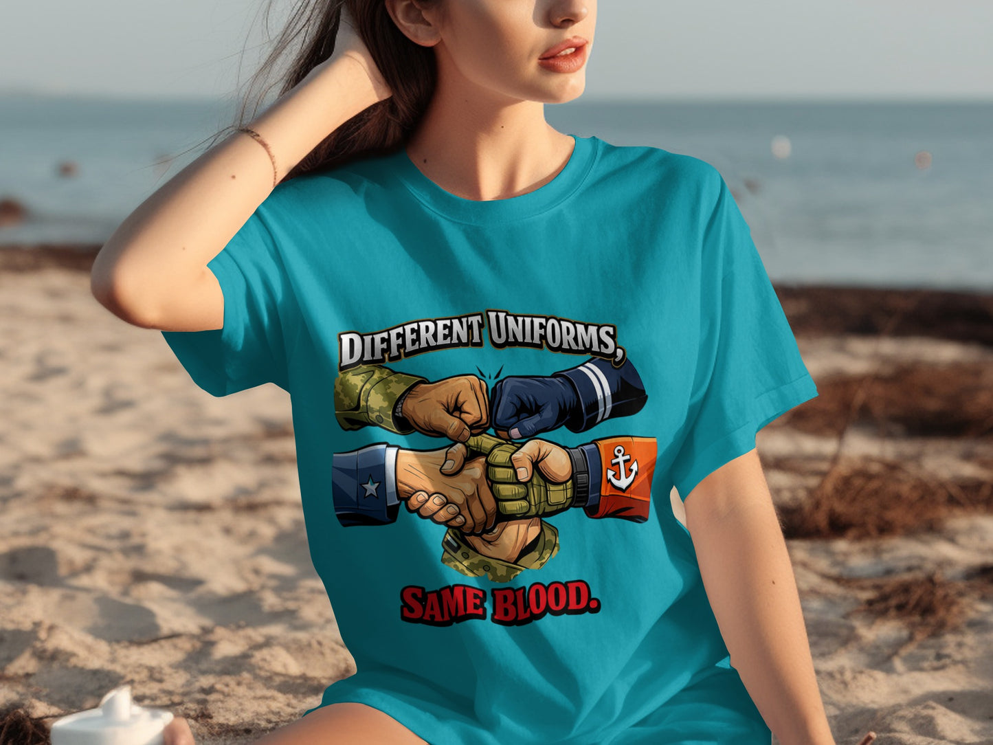 T-shirt with "Different Uniforms, Same Blood" graphic of diverse hands in military and naval uniforms.